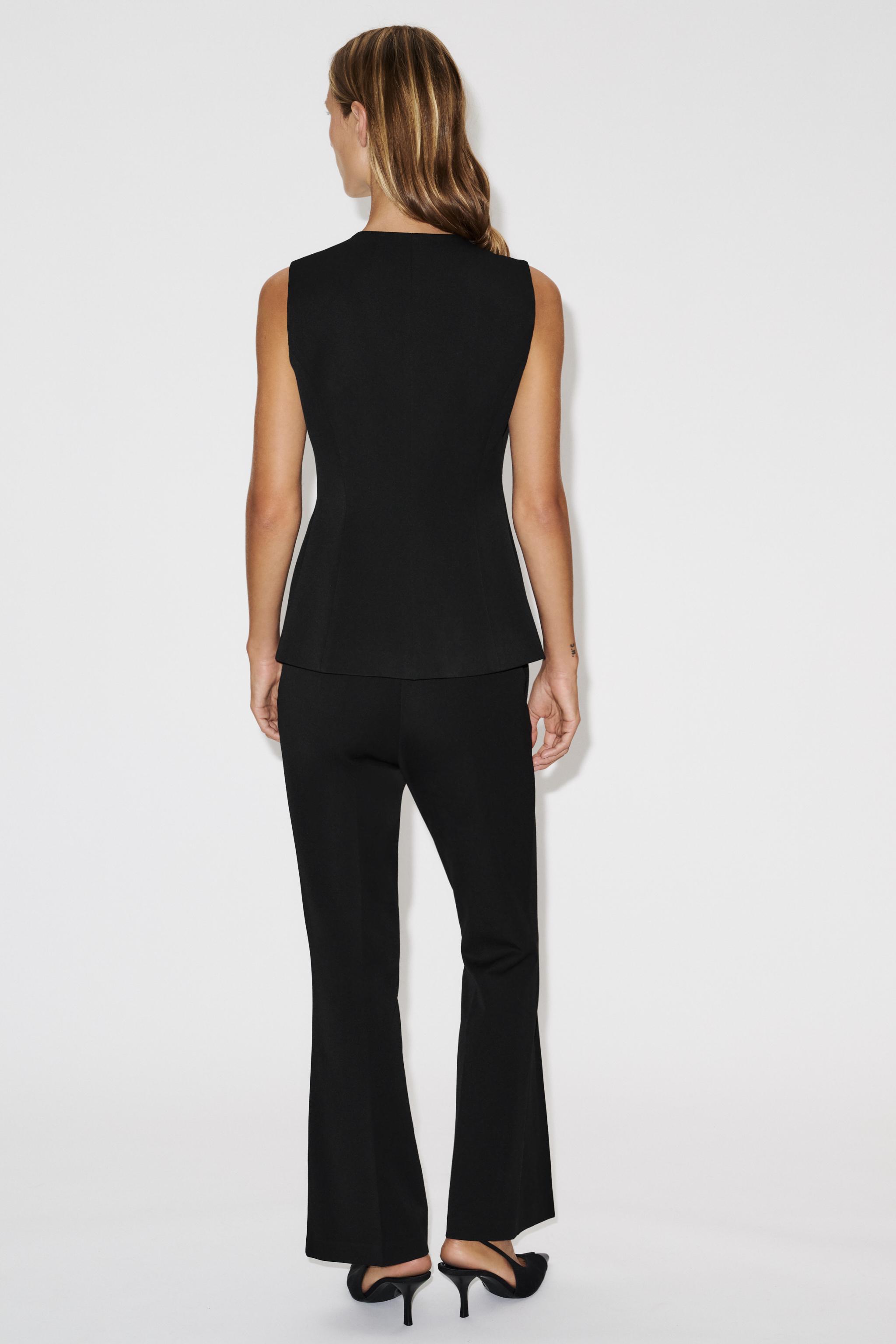BELTED FLARE PANTS